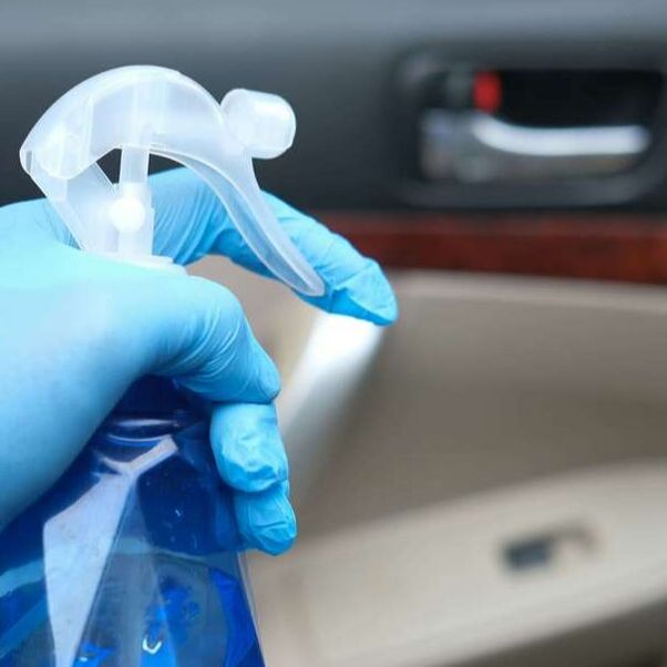 car cleaning inside with detergent spray